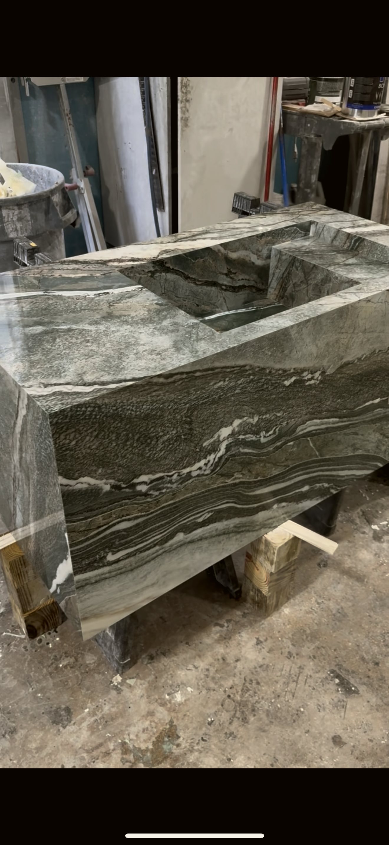 Dramatic veined stone slab — real project