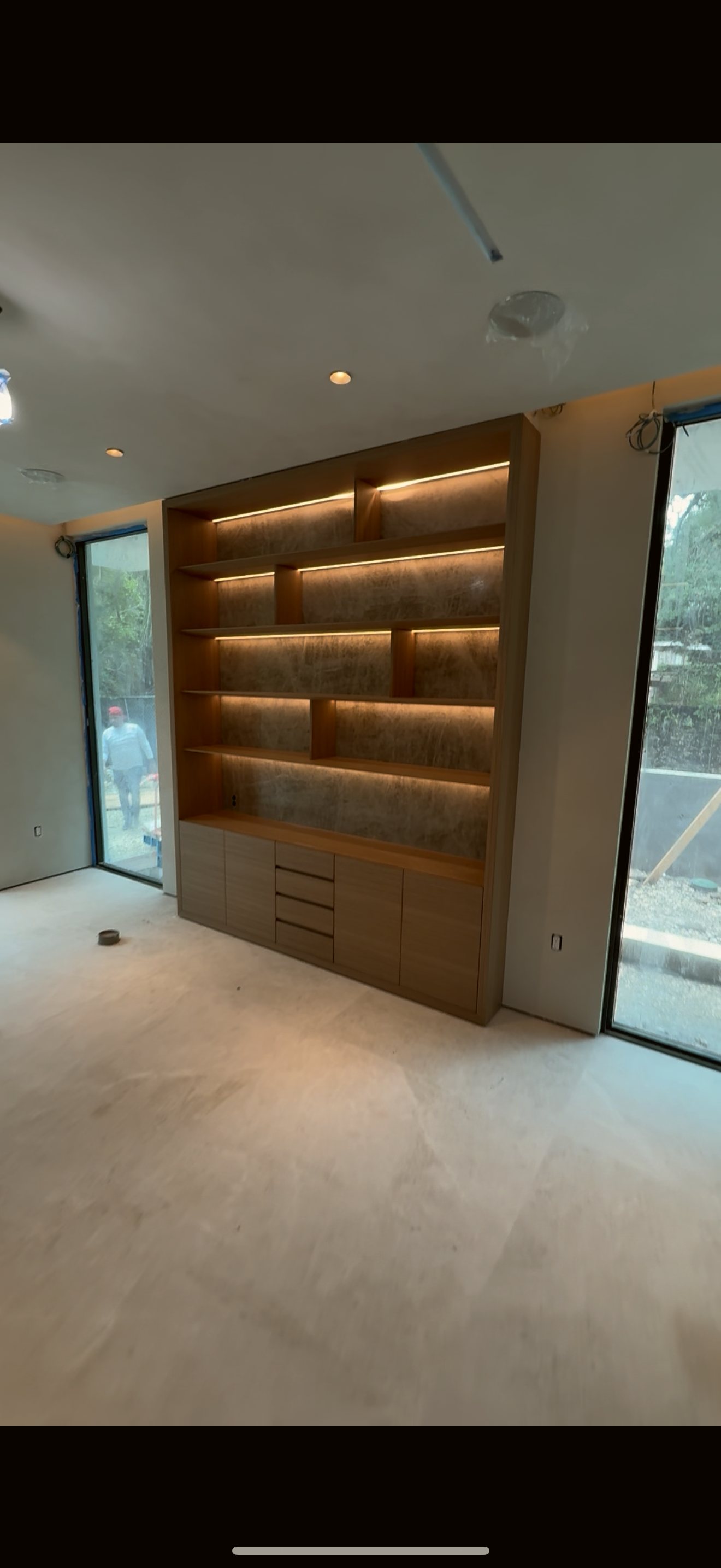 Custom kitchen with lit shelving — recent project